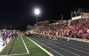 with Pioneer at Brighton High School where we donated 1000.00 to their Football and dance program.